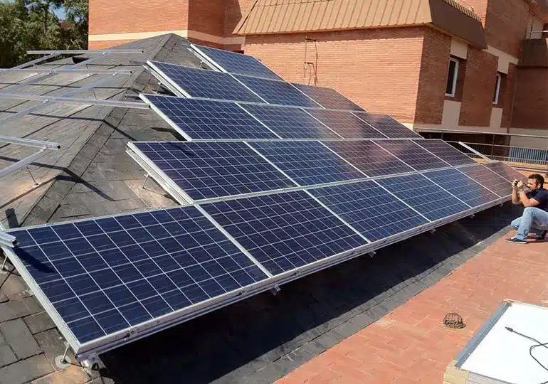 Solar panel installation process on the roof of Mundet